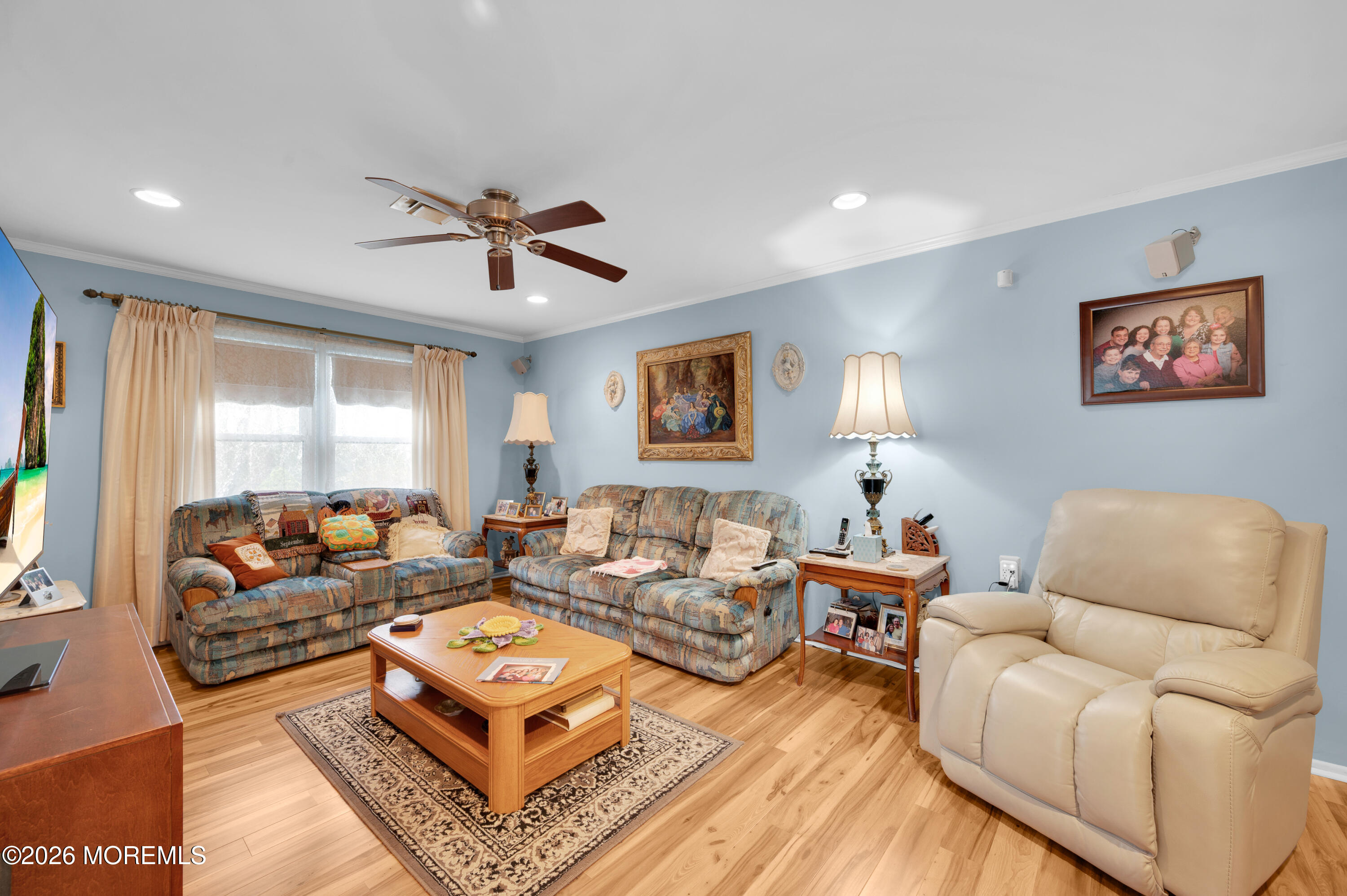 46 Baser Lane Brick, NJ 08724 - Photo 7 of 31 a living room with furniture ceiling fan and a rug