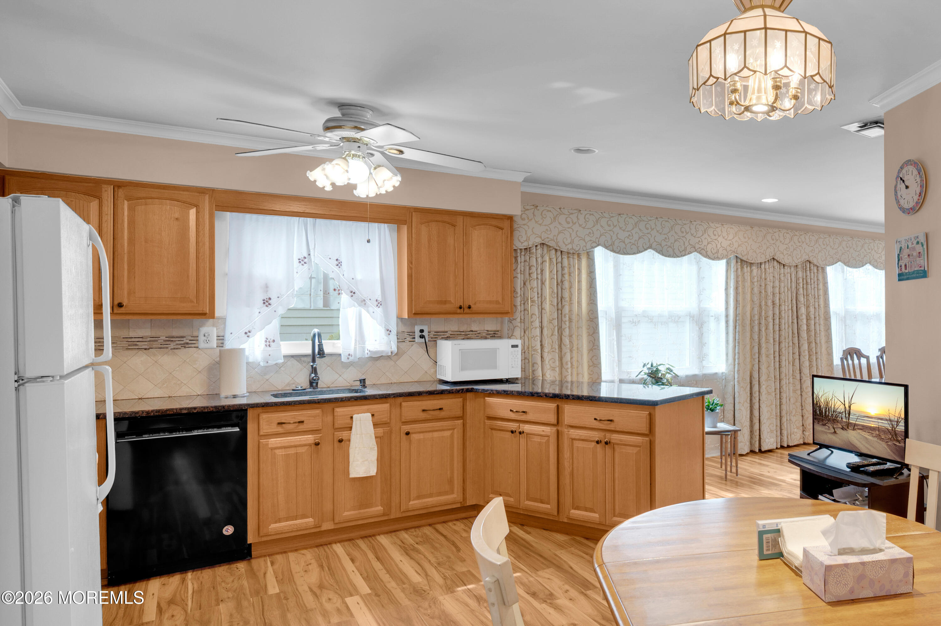 46 Baser Lane Brick, NJ 08724 - Photo 10 of 31 a kitchen with stainless steel appliances granite countertop a sink and cabinets