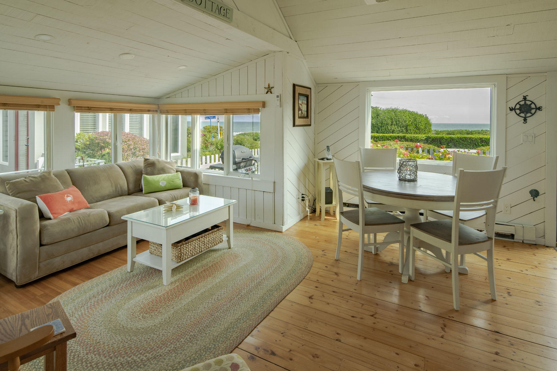 14 Race Point Road Mashpee, MA 02649 - Photo 11 of 18 a living room with furniture and a large window