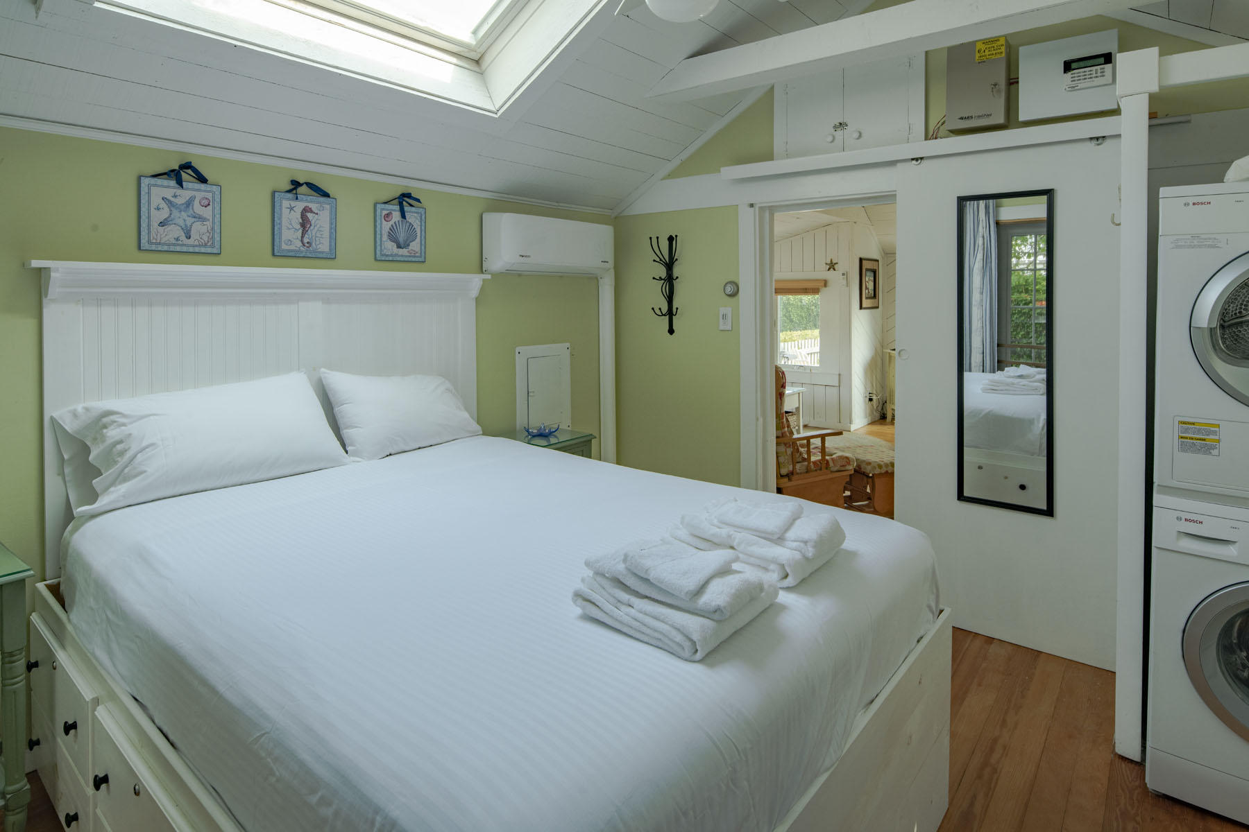 14 Race Point Road Mashpee, MA 02649 - Photo 13 of 18 a bedroom with a bed and a couch