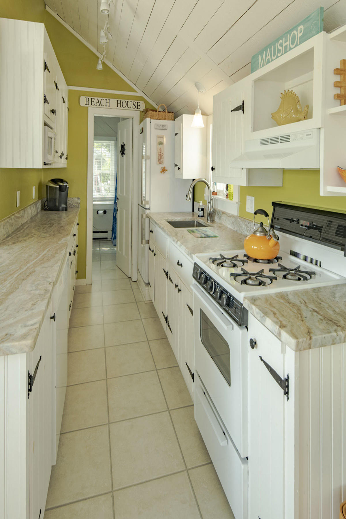 14 Race Point Road Mashpee, MA 02649 - Photo 3 of 18 a kitchen with stainless steel appliances granite countertop a sink and cabinets