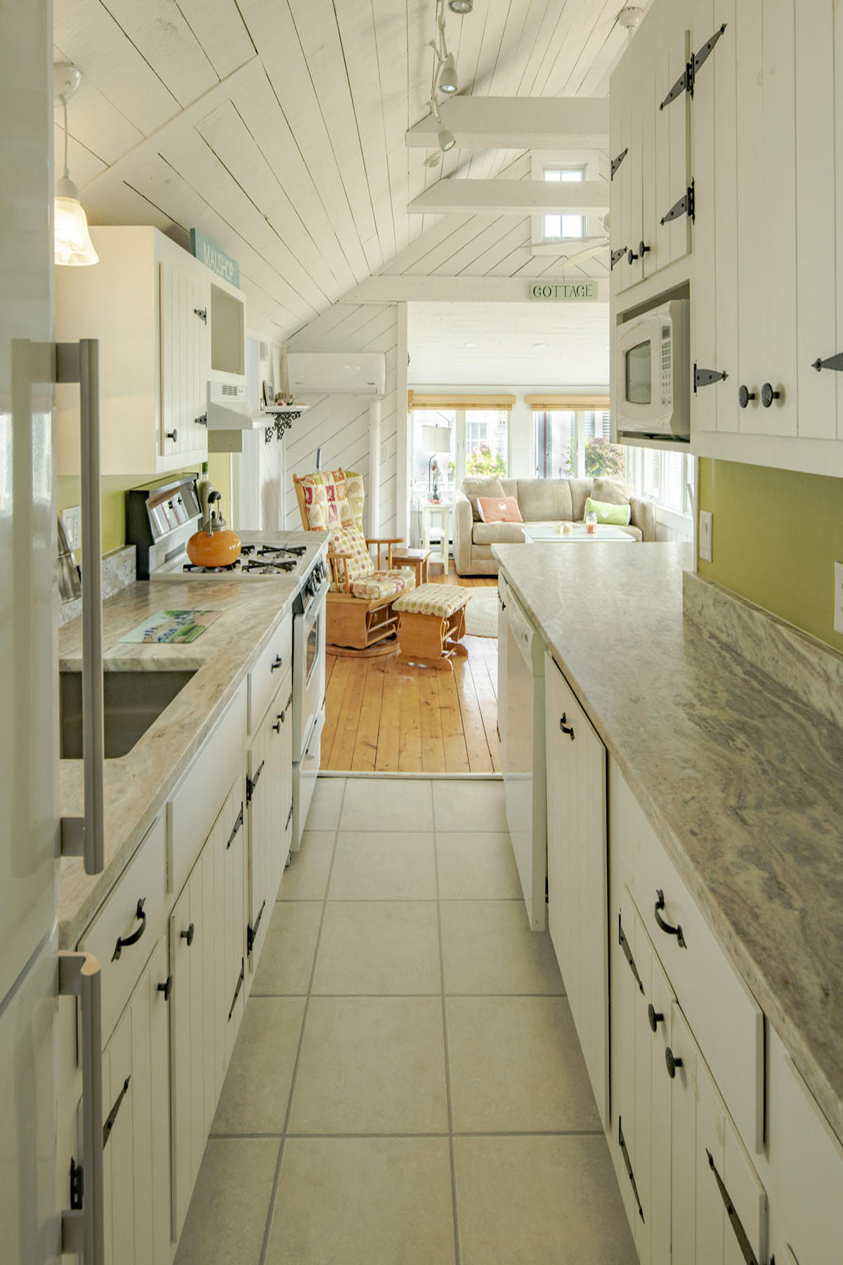 14 Race Point Road Mashpee, MA 02649 - Photo 4 of 18 a large kitchen with stainless steel appliances lots of counter space and a sink