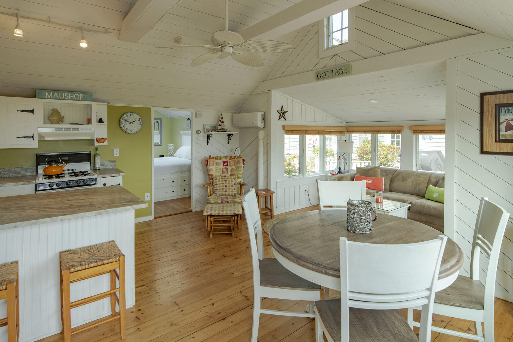 14 Race Point Road Mashpee, MA 02649 - Photo 6 of 18 a dining room with furniture and wooden floor