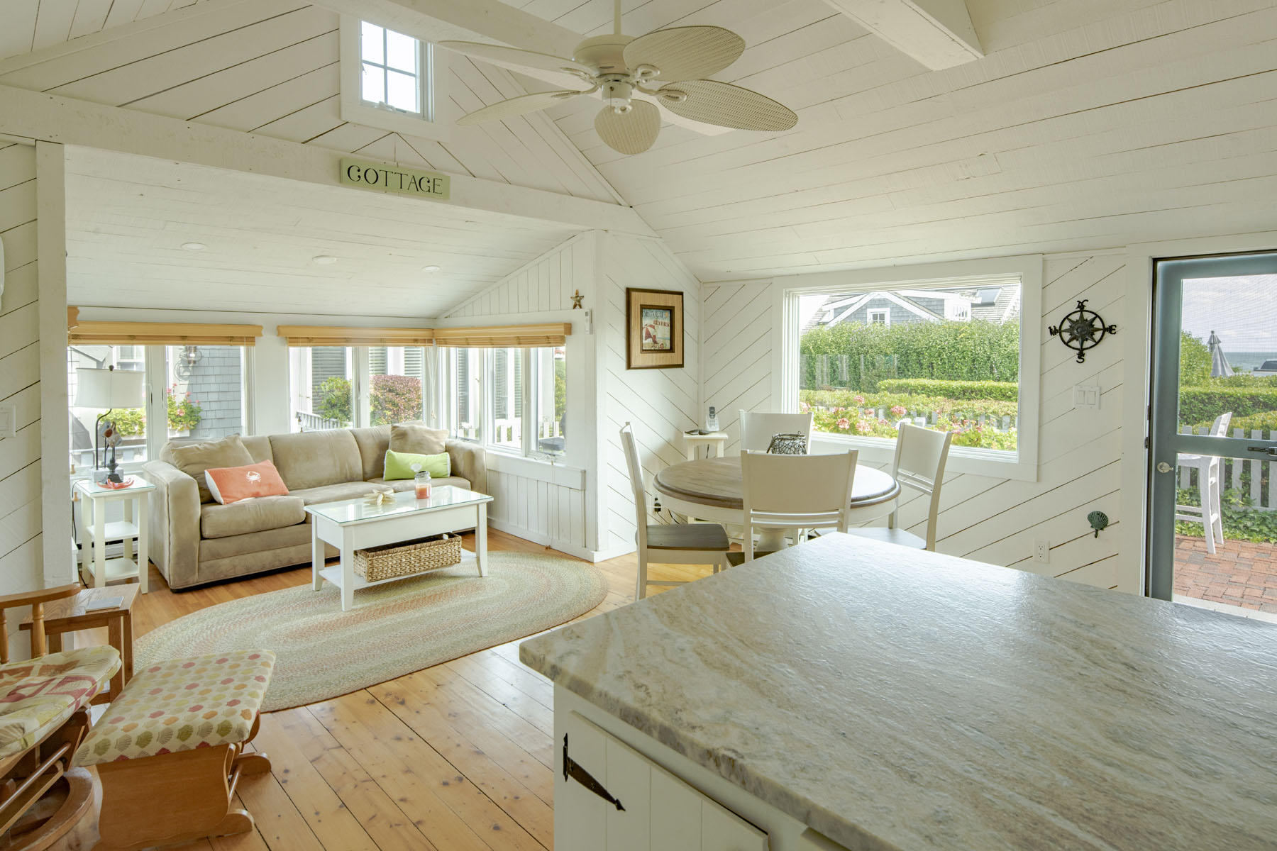 14 Race Point Road Mashpee, MA 02649 - Photo 9 of 18 a living room with furniture and a wooden floor