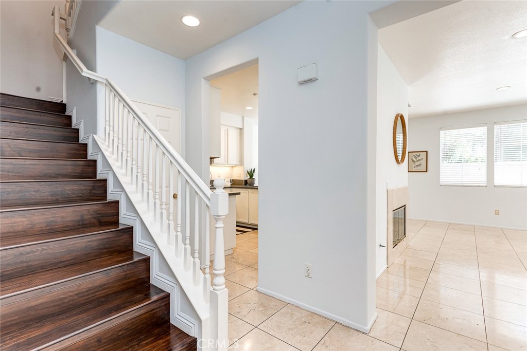 38 Daisy Irvine, CA 92618 - Photo 18 of 41 a view of an entryway with wooden floor and stairs