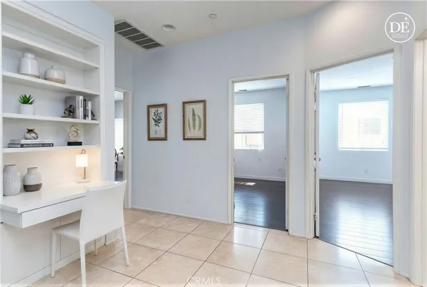a bathroom with a sink vanity and a mirror