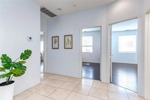 a bathroom with a sink double vanity and a mirror