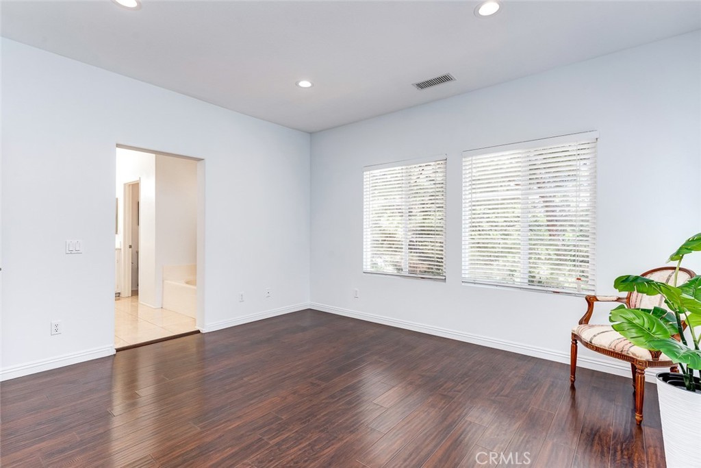 38 Daisy Irvine, CA 92618 - Photo 25 of 41 an empty room with wooden floor and a window