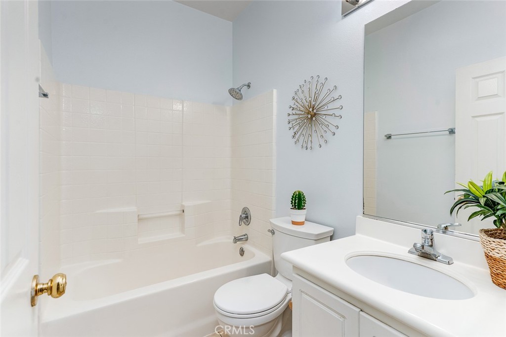 38 Daisy Irvine, CA 92618 - Photo 30 of 41 a bathroom with a granite countertop sink a toilet and bathtub