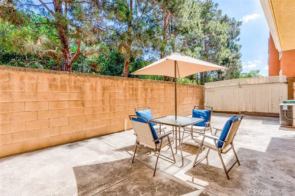 a view of a livingroom with furniture and a fireplace