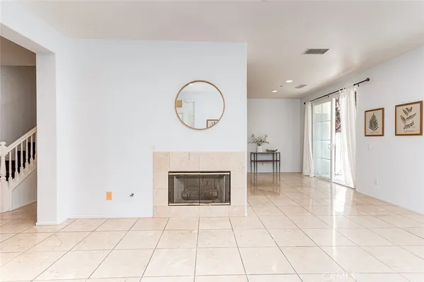 a workspace with furniture and a potted plant
