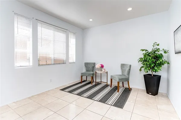 a kitchen with a sink cabinets and window