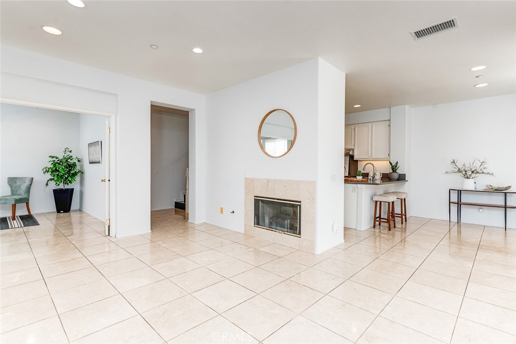38 Daisy Irvine, CA 92618 - Photo 10 of 41 a living room with furniture and a fireplace