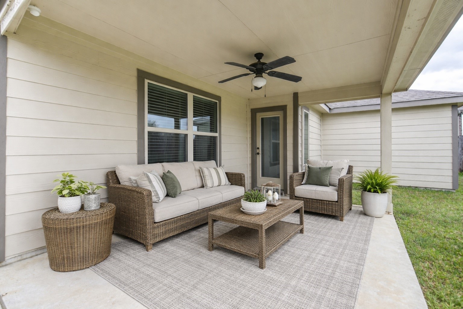 12326 Sabine Point Drive Humble, TX 77346 - Photo 6 of 42 a living room with furniture and a potted plant