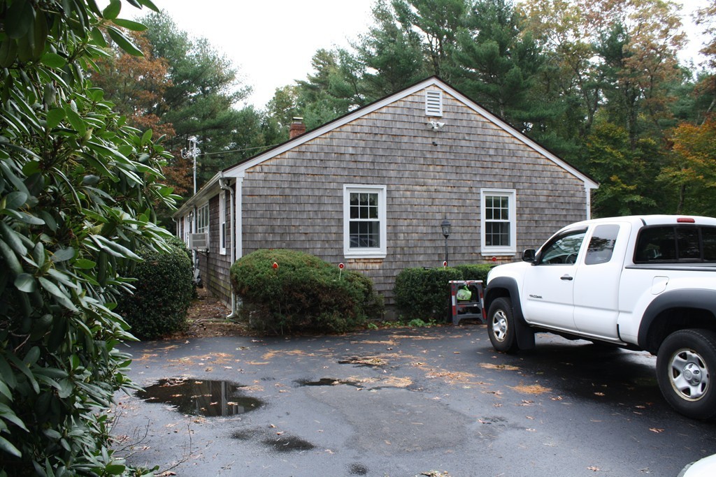 28 Morton Road Freetown, MA 02717 - Photo 3 of 29 a front view of a house with a yard