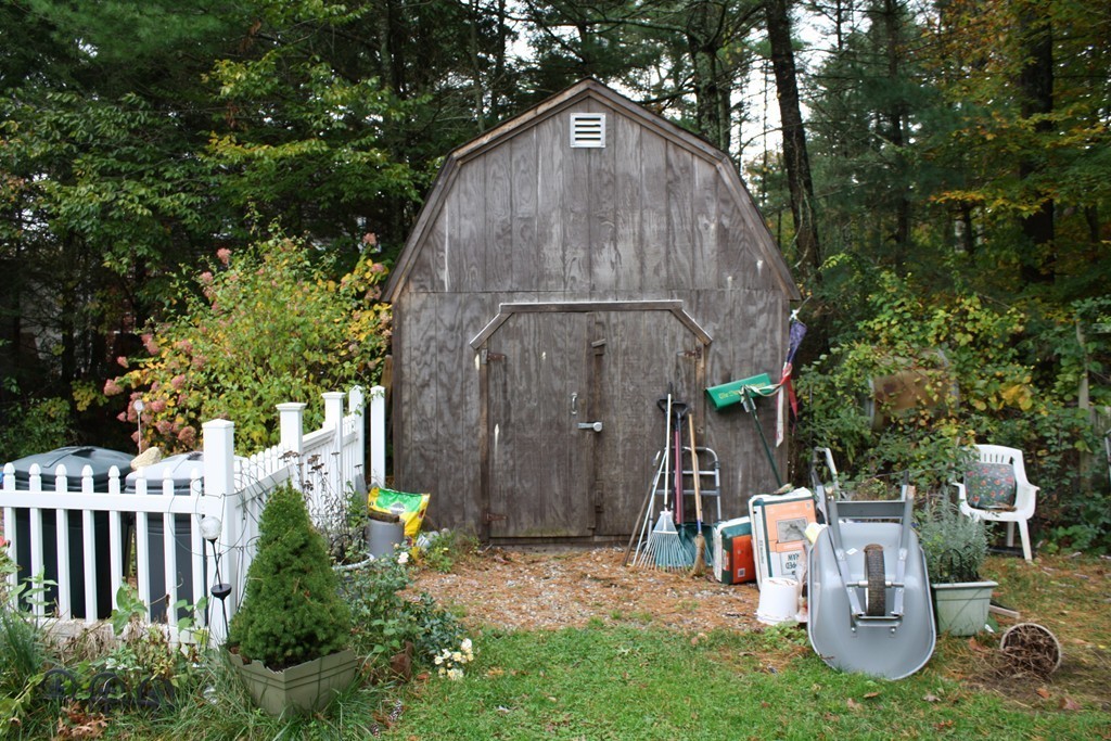 28 Morton Road Freetown, MA 02717 - Photo 6 of 29 a view of backyard with plants and outdoor seating
