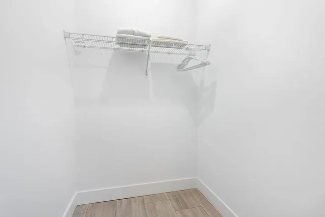 a view of a room with racks on the wall