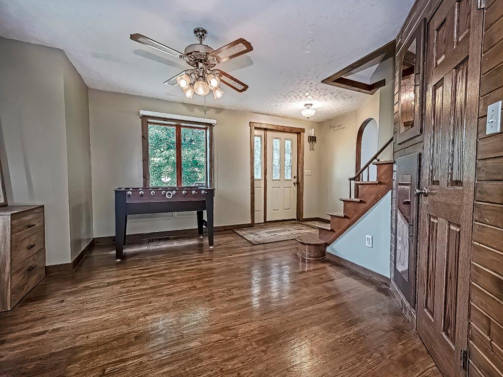 111 Brinker Road Butler, PA 16002 - Photo 4 of 23 a view of entryway and hall with wooden floor