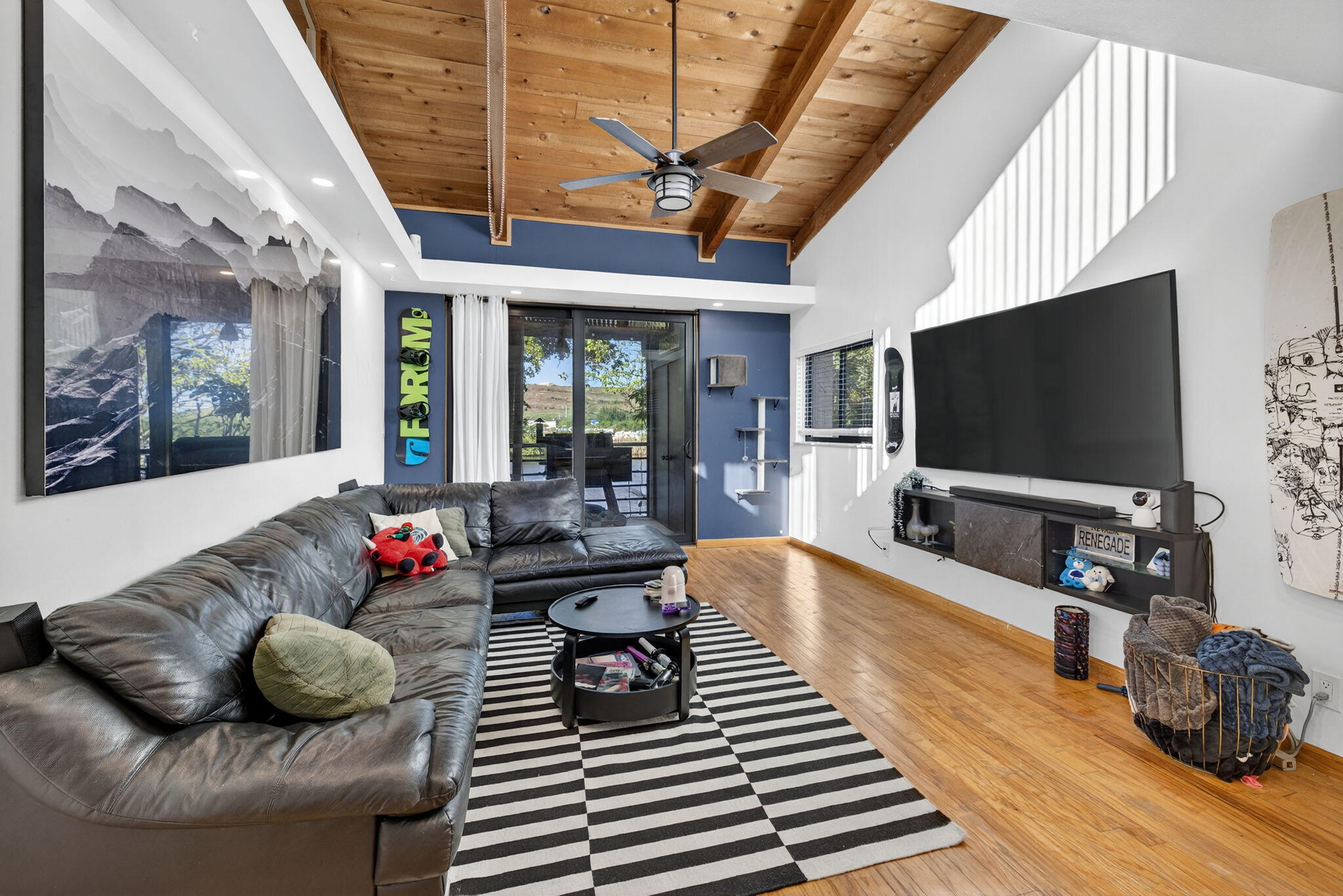 4491 Crystal Lake Drive, Unit 201A Deerfield Beach, FL 33073 - Photo 16 of 36 a living room with furniture and a flat screen tv