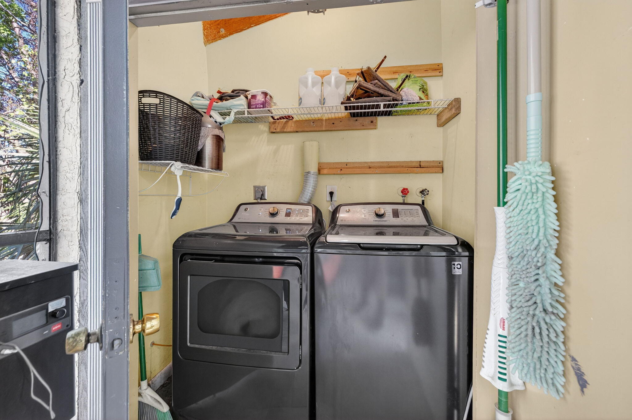 4491 Crystal Lake Drive, Unit 201A Deerfield Beach, FL 33073 - Photo 29 of 36 a utility room with dryer and washer
