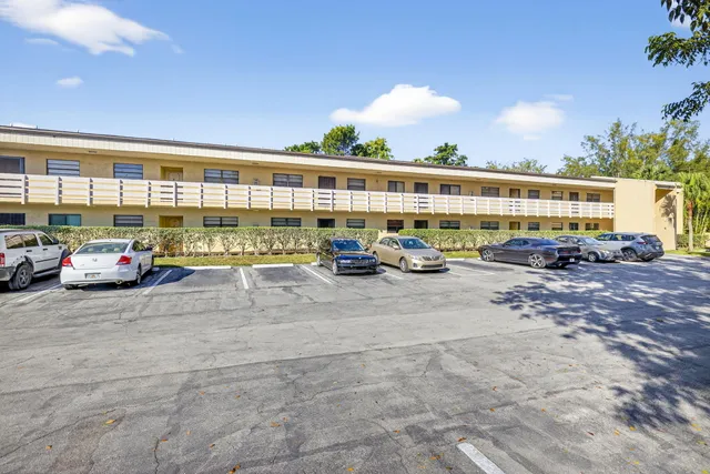 a cars parked in front of a building