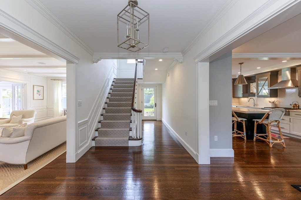 25 Bonad Road Newton, MA 02465 - Photo 2 of 26 a view of a livingroom with furniture wooden floor and windows