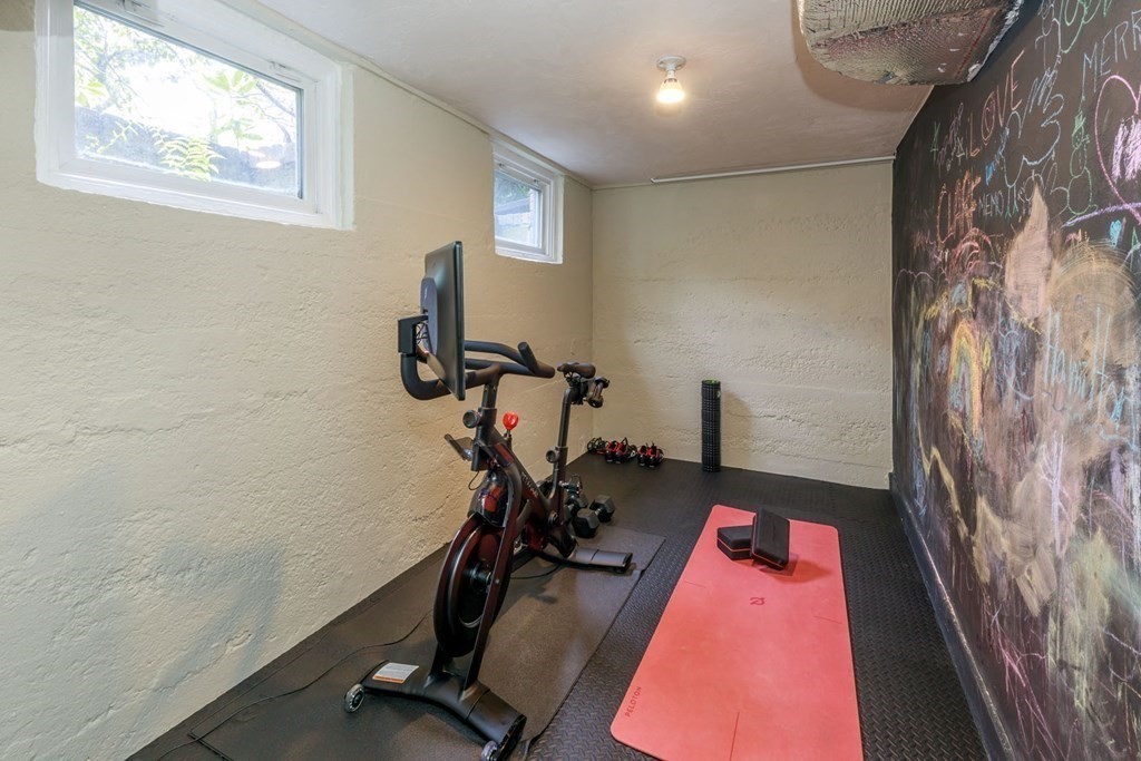 25 Bonad Road Newton, MA 02465 - Photo 23 of 26 a room with gym equipment and windows