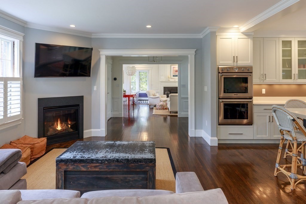 25 Bonad Road Newton, MA 02465 - Photo 8 of 26 a living room with furniture fireplace and flat screen tv