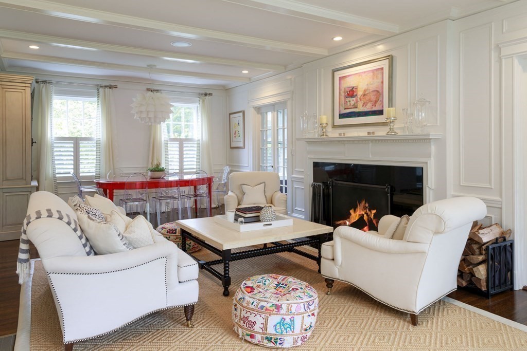 25 Bonad Road Newton, MA 02465 - Photo 10 of 26 a living room with furniture and a fireplace