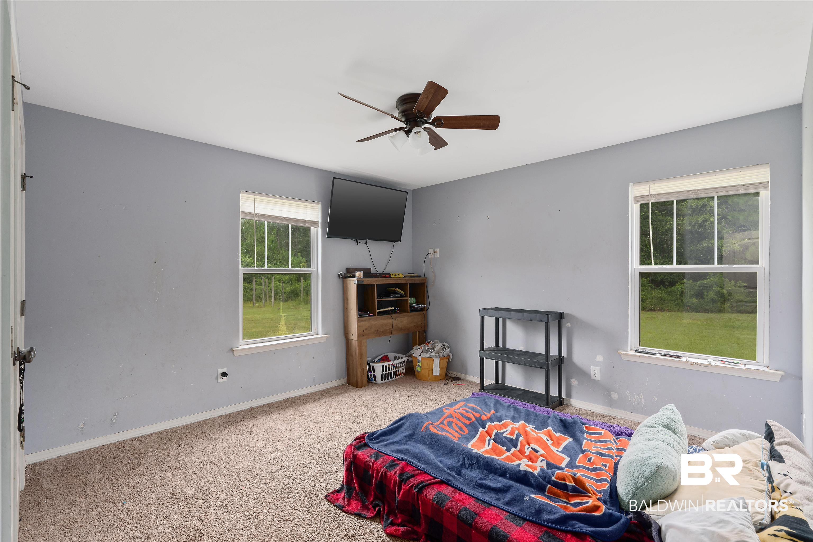 20076 Patty Jr Lane Bay Minette, AL 36507 - Photo 20 of 31 Bedroom with light carpet and ceiling fan