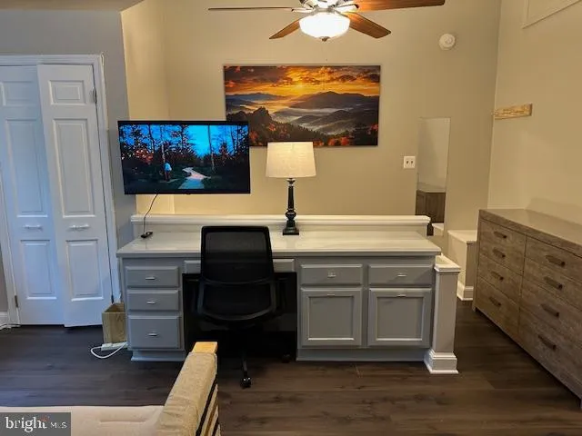 a bedroom with a bed and a chair