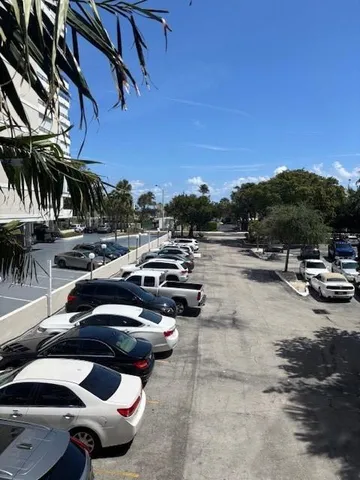 a kitchen with a cabinets and white appliances