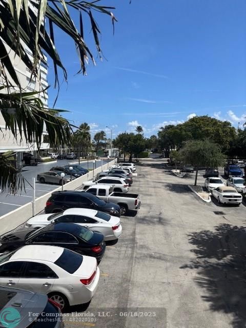 1421 South Ocean Boulevard, Unit 218 Pompano Beach, FL 33062 - Photo 2 of 10 a view of a patio with swimming pool