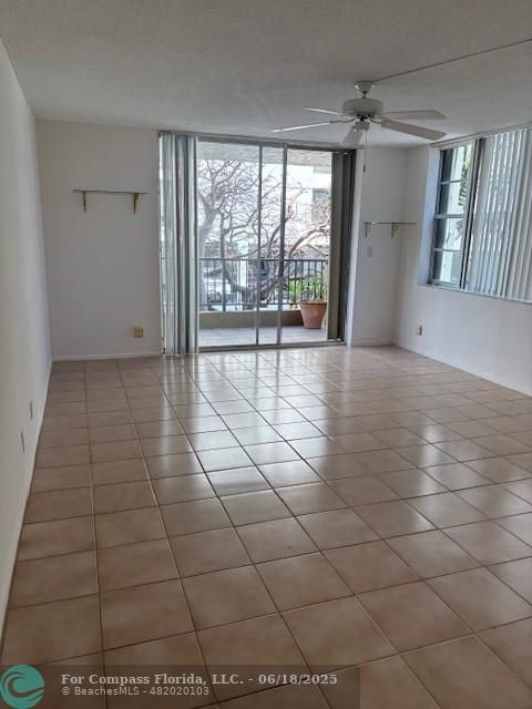 1421 South Ocean Boulevard, Unit 218 Pompano Beach, FL 33062 - Photo 4 of 10 a view of an empty room with a window