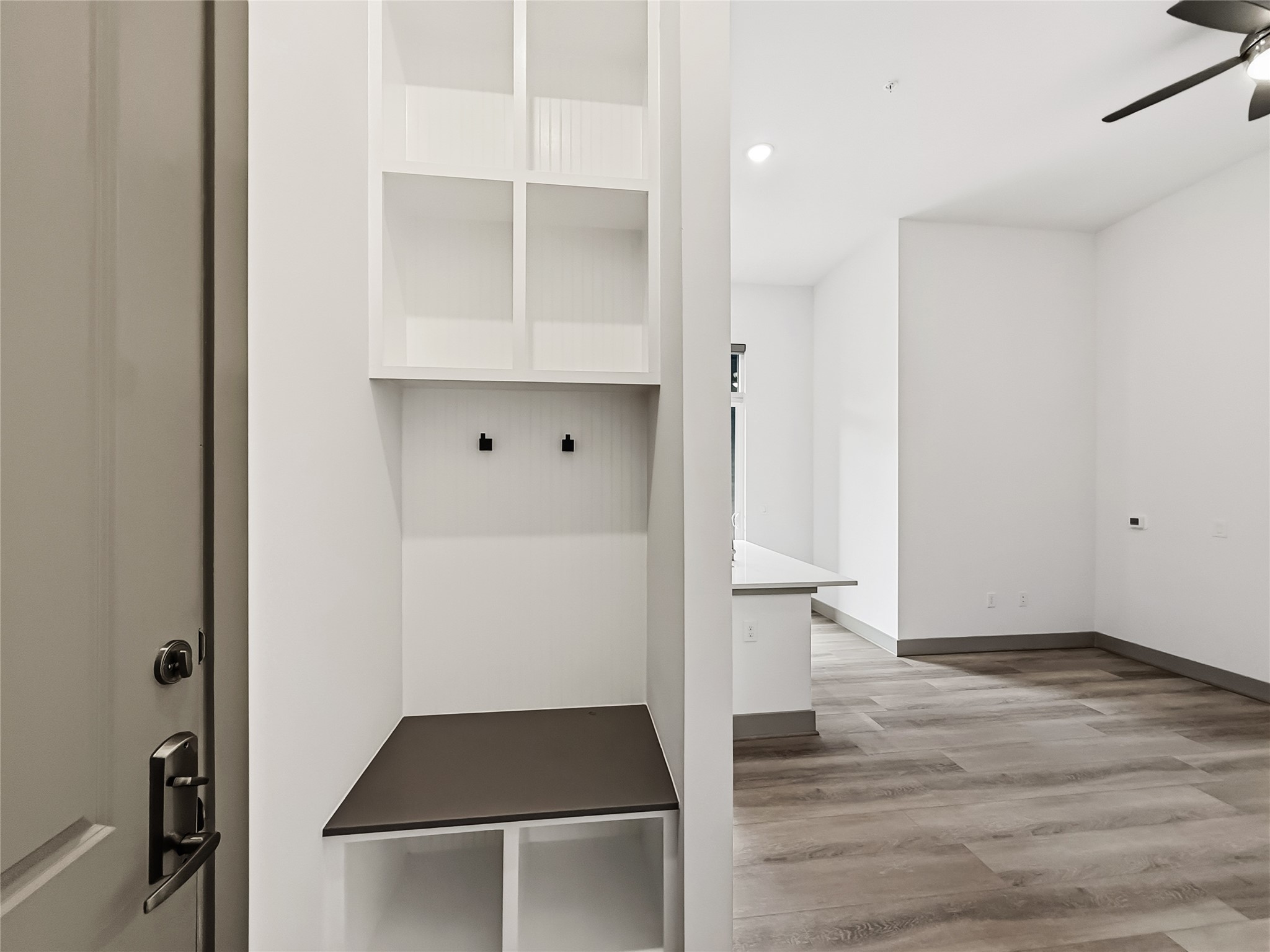 170 Malone Street, Unit 3107 Houston, TX 77007 - Photo 5 of 26 a view of walk in closet with wooden floor