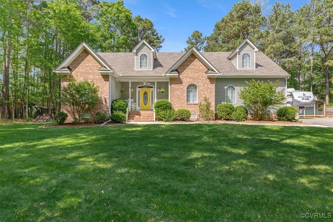 430 Enon Church Road Chester, VA 23836 - Photo 1 of 1 a front view of a house with a yard and trees
