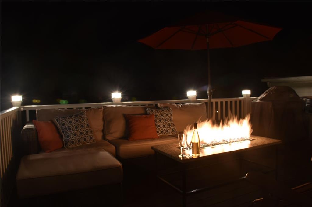 1727 Rutledge Street Pittsburgh, PA 15211 - Photo 13 of 16 RELAX AT NIGHT ON THE DECK WITH THE ENJOYABLE FIRE PLACE
