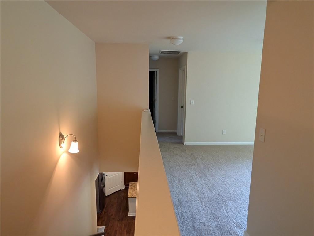 105 Whitney Way Dallas, GA 30157 - Photo 15 of 30 a view of hallway with stairs