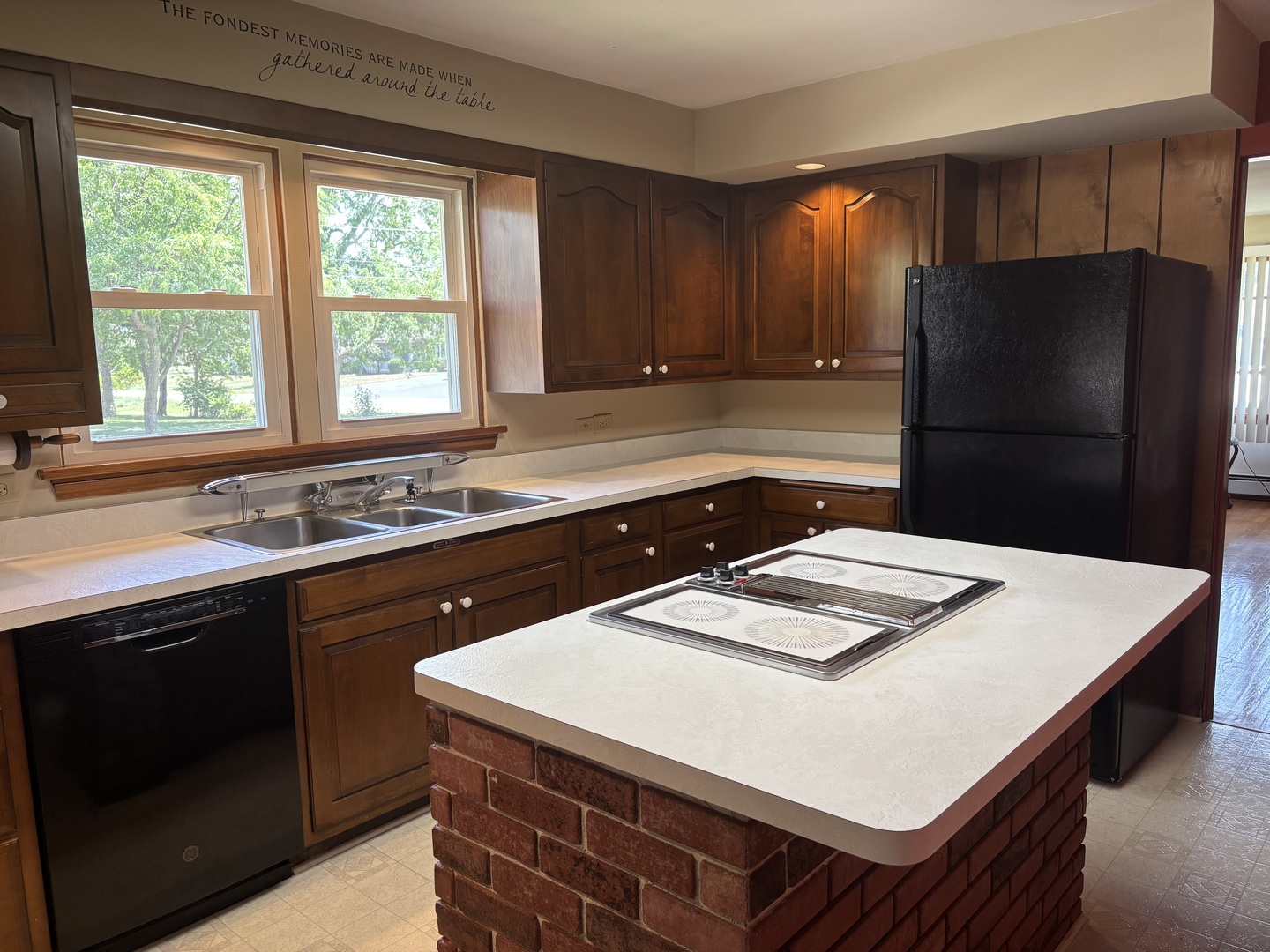 1378 East Street Crete, IL 60417 - Photo 2 of 12 a kitchen with a sink a stove and refrigerator