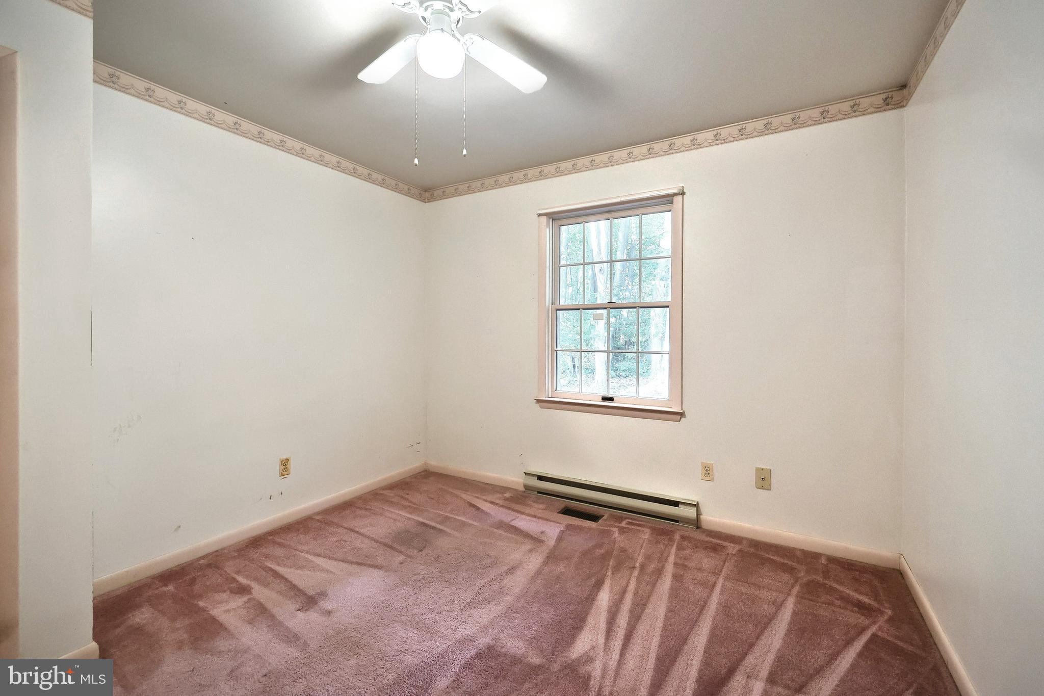 1059 Main St Extension Felton, PA 17322 - Photo 33 of 63 a view of an empty room with a window