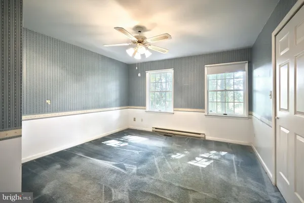 a view of a room with a bathroom