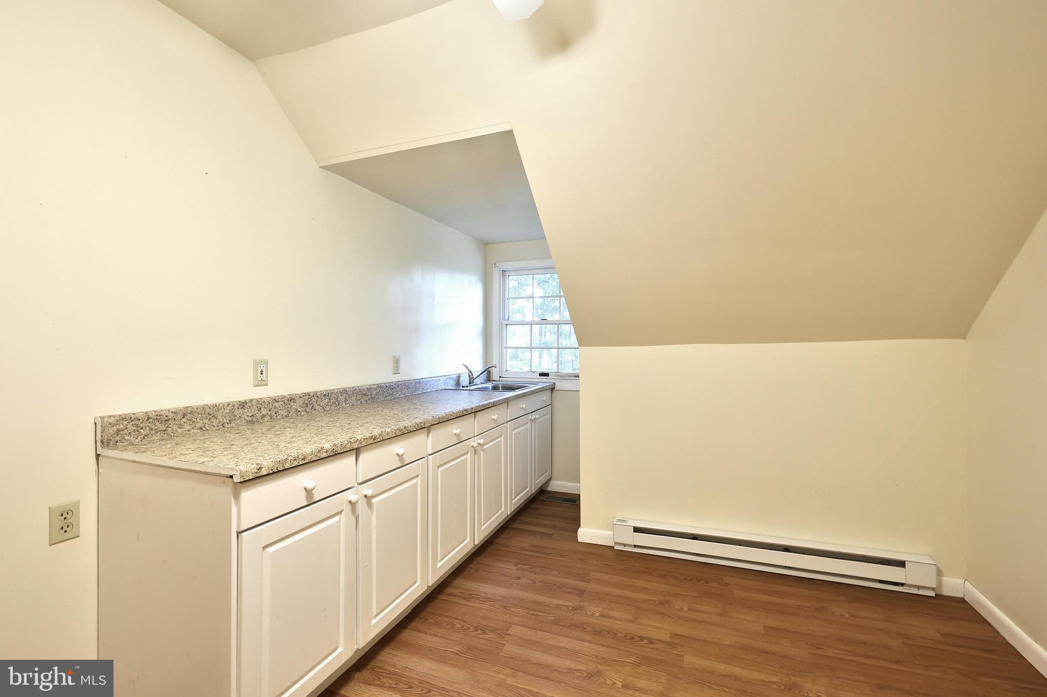 1059 Main St Extension Felton, PA 17322 - Photo 41 of 63 a bathroom with a granite countertop sink and a mirror