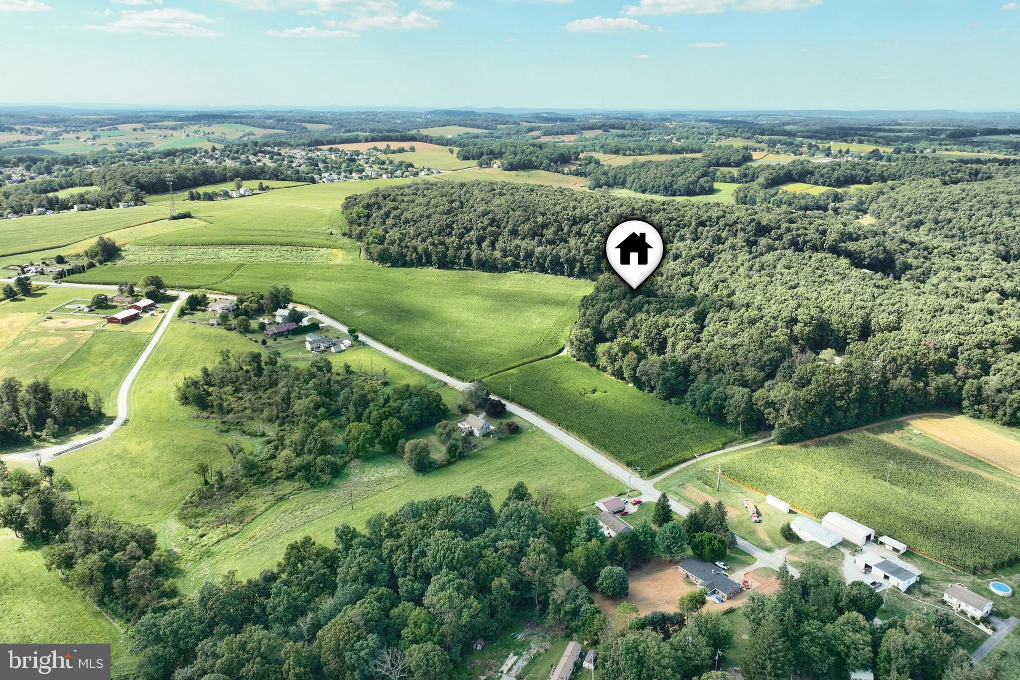1059 Main St Extension Felton, PA 17322 - Photo 53 of 63 an aerial view of a house with a yard and outdoor seating