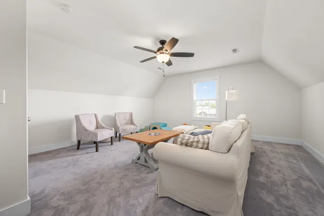 a bathroom with a toilet a sink and a shower