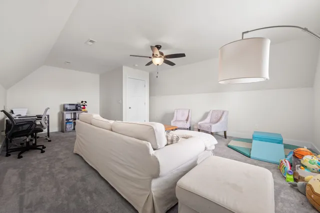 a bathroom with a toilet a sink and a shower