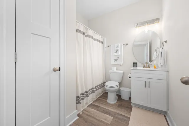 an aerial view of a houses with outdoor space and street view