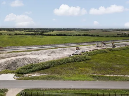 a view of a lake with a big yard