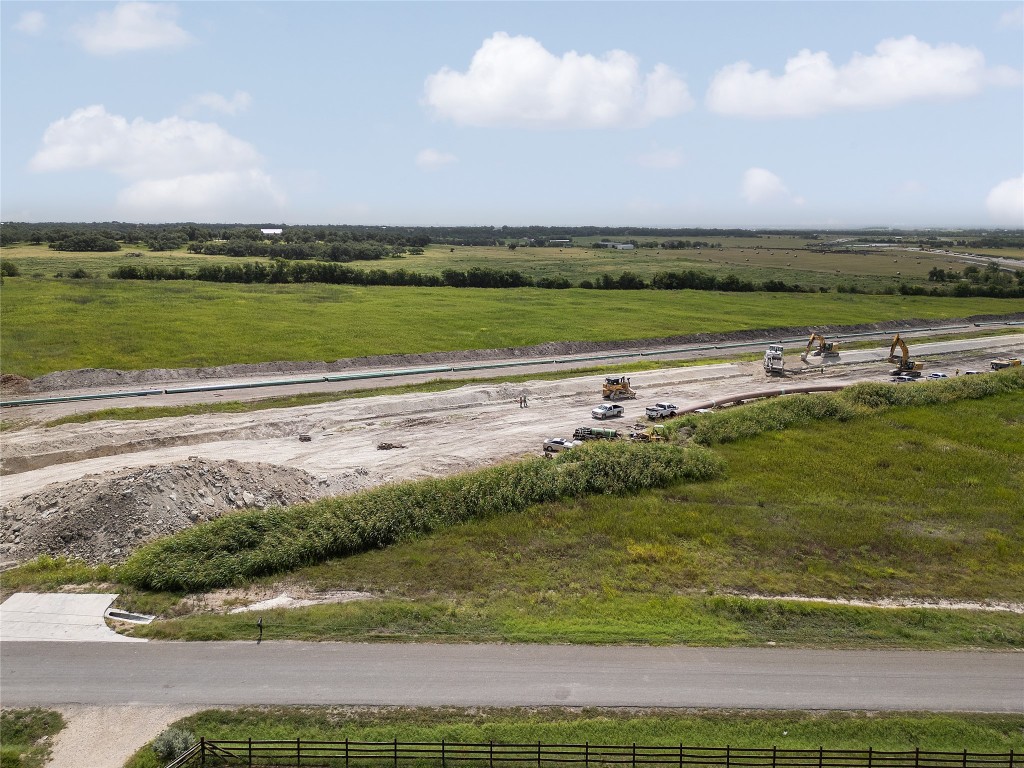 1300 County Road 153 Georgetown, TX 78626 - Photo 3 of 4 a view of a lake with a big yard