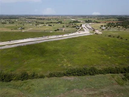 a view of an ocean and city