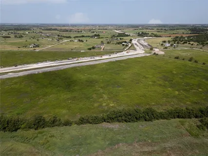 a view of an ocean and city